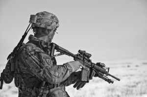 soldier aiming rifle
